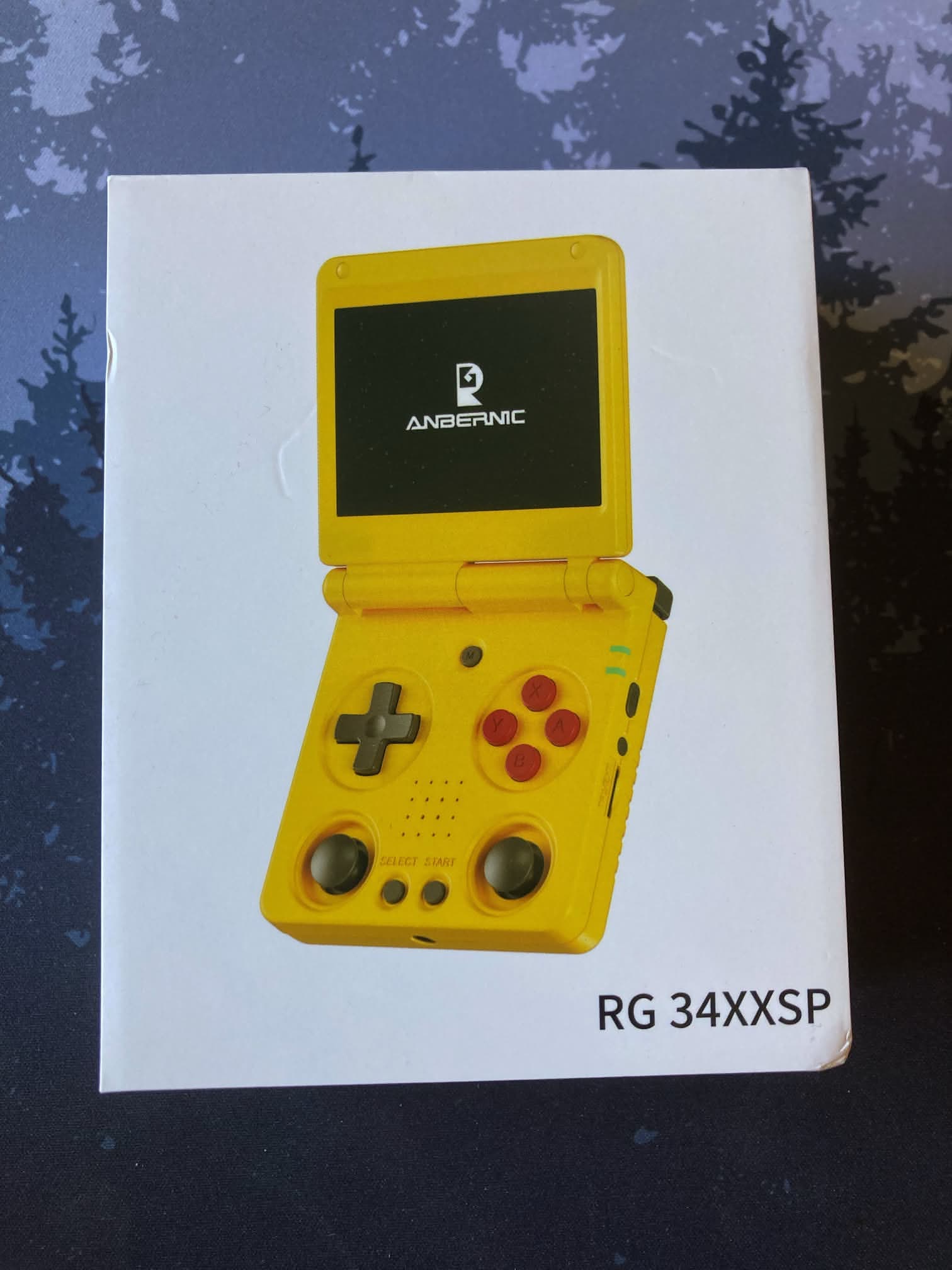 ANBERNIC RG 34XXSP consola retro plebagle en su caja