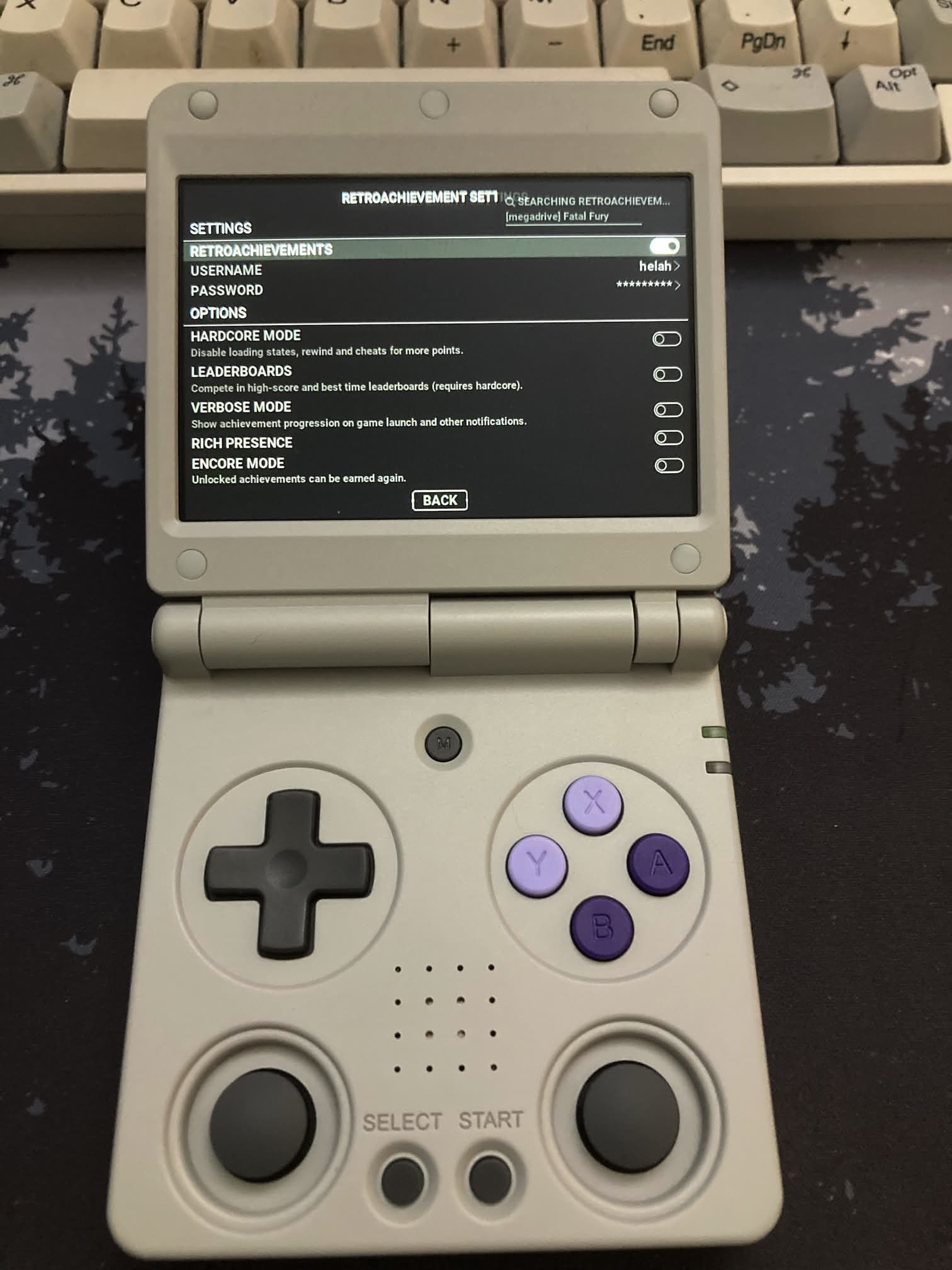 Rocknix en la ANBERNIC RG 34XXSP: START > Game Settings > RetroAchievement Settings