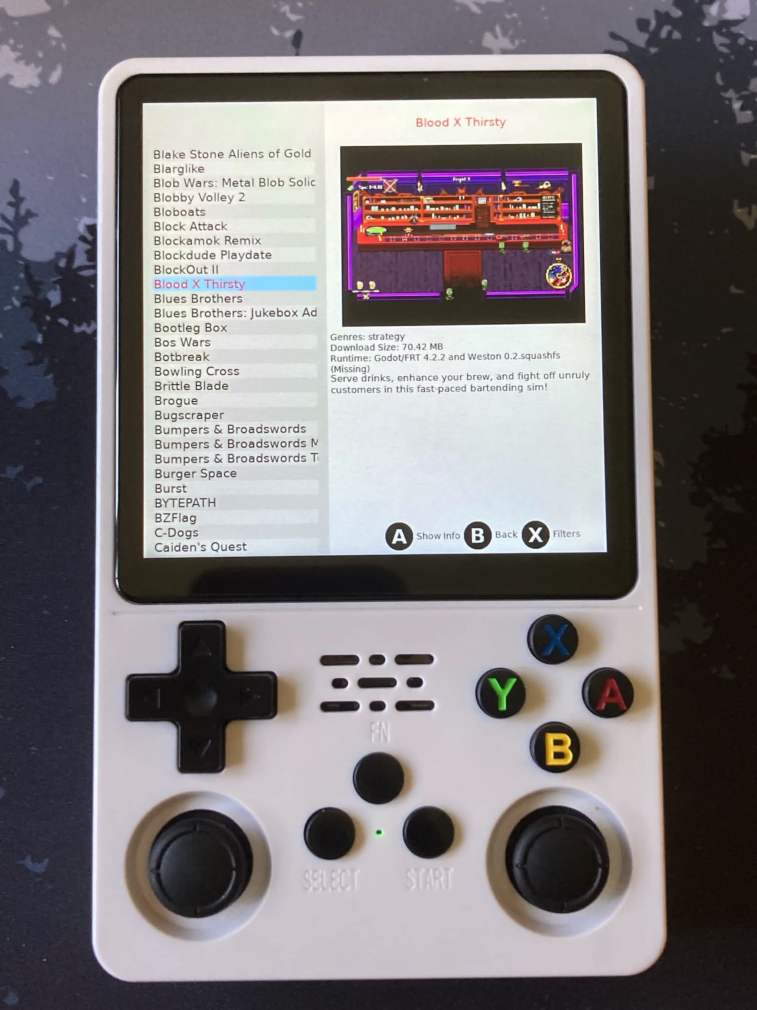 ArkOS en la R36Plus: activamos Portmaster para descargar videojuegos gratis